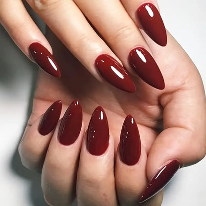 Bold Crimson Stiletto Nails - High-Impact Glam for Every Occasion