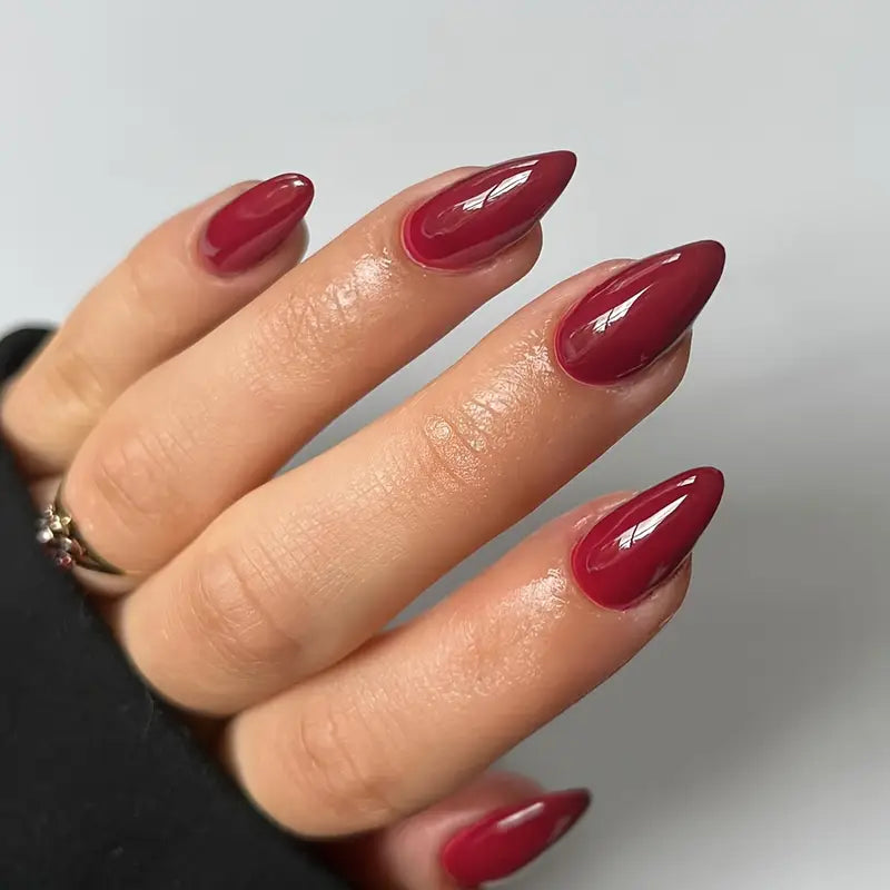 Bold Crimson Stiletto Nails - High-Impact Glam for Every Occasion